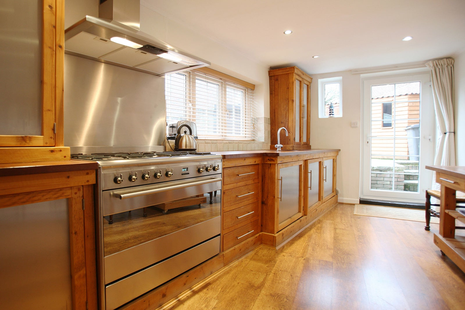 kitchen with large range hood