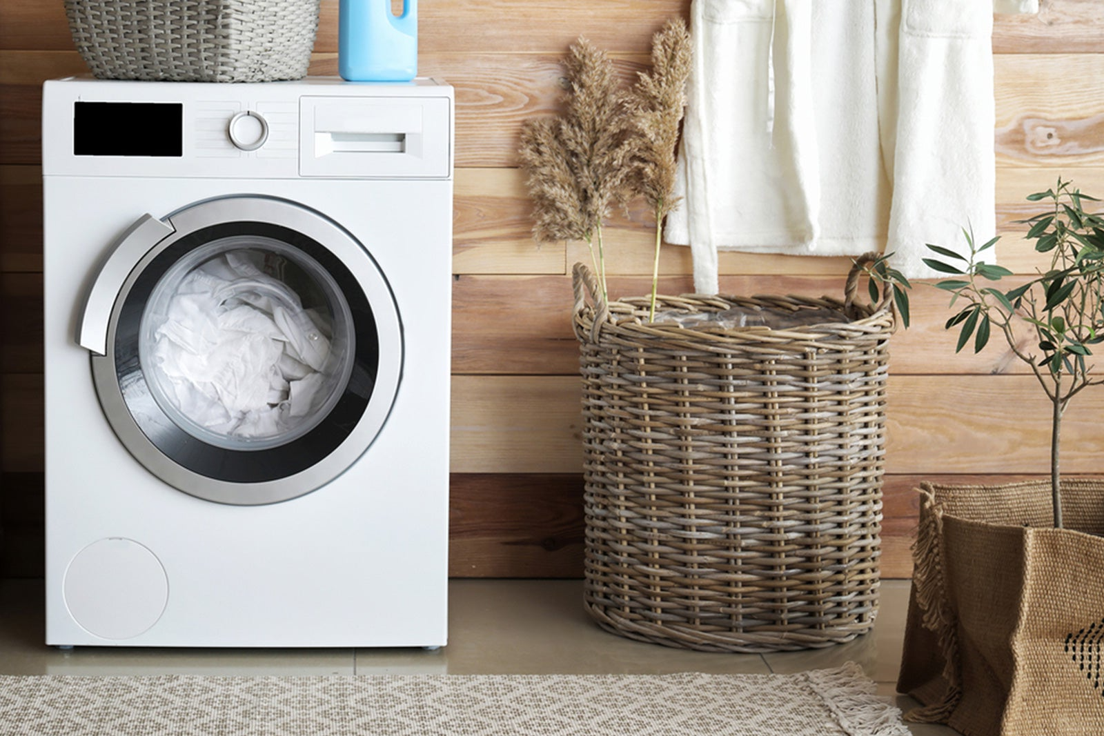 Dryer next to laundry basket